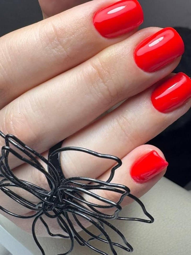 Red gel nail manicure
